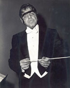 M. T. Graves conducts the orchestra